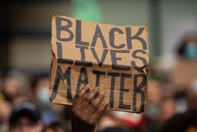 SEATTLE, WA - JUNE 14: Black Lives Matter protesters rally at Westlake Park before marching through the downtown area on June 14, 2020 in Seattle, United States. Black Lives Matter events continue daily in the Seattle area in the wake of the death of George Floyd. (Photo by David Ryder/Getty Images) NNL-200615-092317001