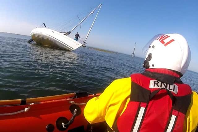 Selsey lifeboatmen go to the aid of a yacht that had run aground on the Mixon rocks off Selsey Bill