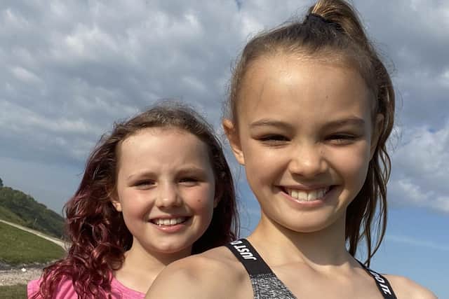 Eden Capon, eight, and Indie Capon, seven, have raised £1,181 for NHS Charities Together