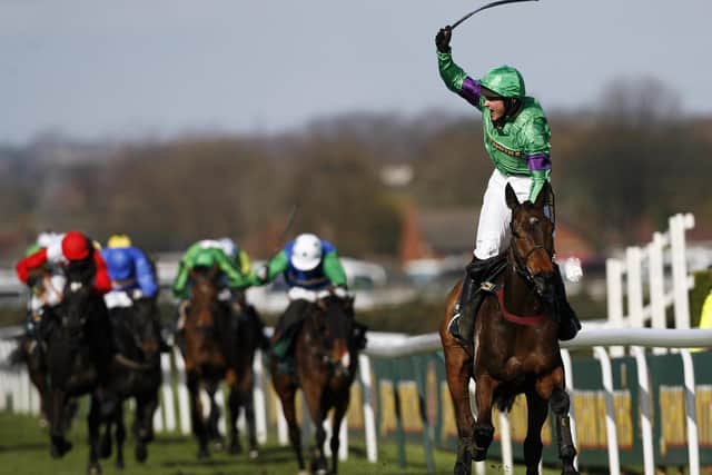Liam Treadwell's greatest day - as he wins the 2009 Grand National on Mon Mome / Picture: Getty