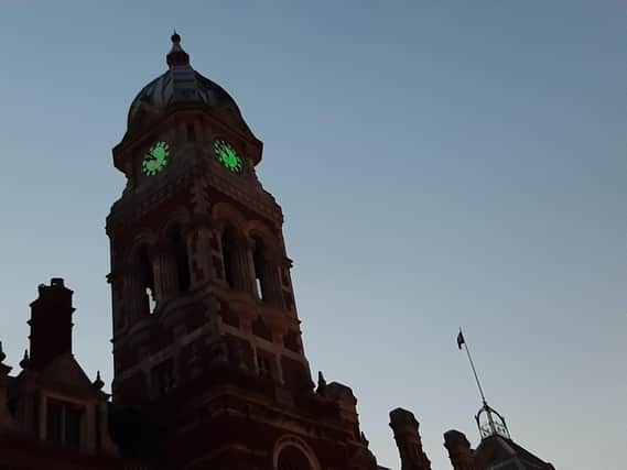 Eastbourne Town Hall clock was lit up green in celebration of St John's Day on June 24 SUS-200625-111256001