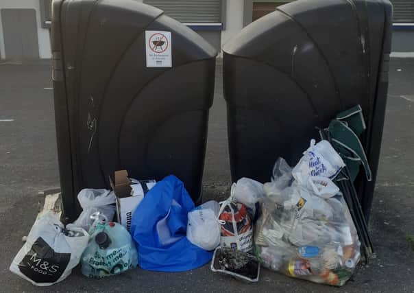 Piles of rubbish left next to bins in Littlehampton