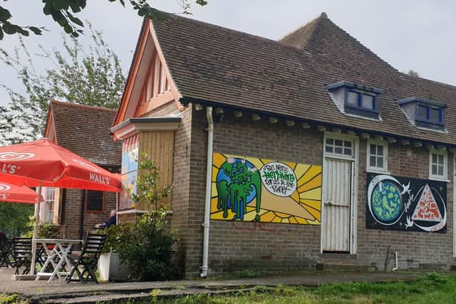 Councillors support cafe’s colourful mural to tackle graffiti. Photo from Eastbourne Borough Council. SUS-211210-094853001