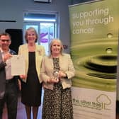 Trevor Chrstmas, treasurer of Olive Tree Cancer Support, Susan Pyper,Lord Lieutenant of West Sussex and Brenda Miller, counsellor and supervisor for Olive Tree Cancer Support with the Queen's Award for Voluntary Services