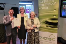 Trevor Chrstmas, treasurer of Olive Tree Cancer Support, Susan Pyper,Lord Lieutenant of West Sussex and Brenda Miller, counsellor and supervisor for Olive Tree Cancer Support with the Queen's Award for Voluntary Services