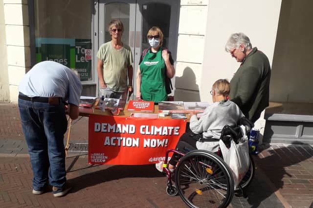 Greenpeace Arun and Adur Group set up a stall in Worthing town centre during Great Big Green Week