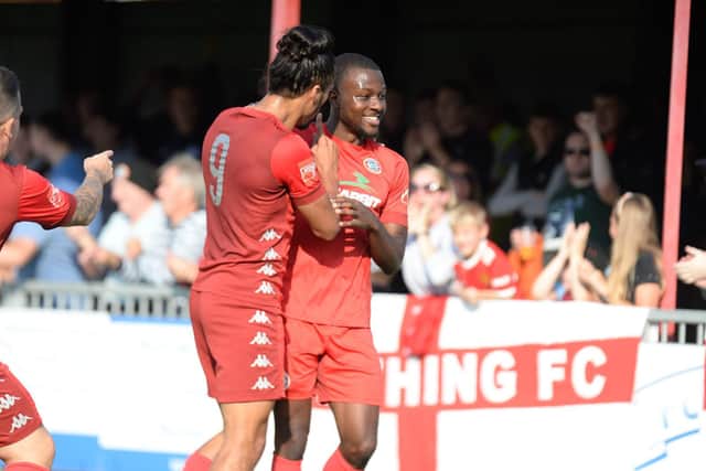 Marvin Armstrong is congratulated on his goal by fellow scorer Dayshonne Golding / Picture: Marcus Hoare