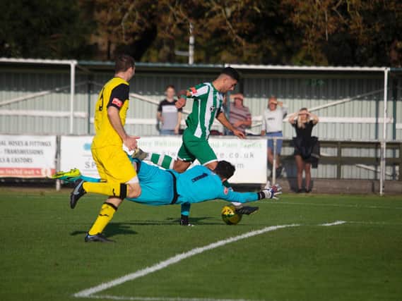 A Chi City chance that didn't get away - Tyrone Madhani pulls one back against Great Wakering Rovers / Picture: Neil Marshall