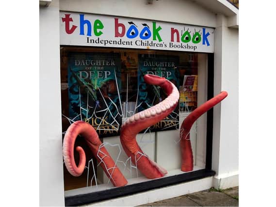 The giant octopus installation was put in place at The Book Nook to mark Bookshop Day and the launch of new book, Daughter of the Deep