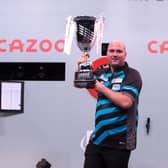 Rob Cross lifts the trophy / Picture: Kais Bodensieck - PDC Europe