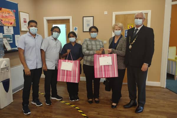 Haywards Heath town mayor Howard Mundin and  Margaret Baker delivered treat bags to care homes for Silver Sunday. Picture: Haywards Heath Town Council.