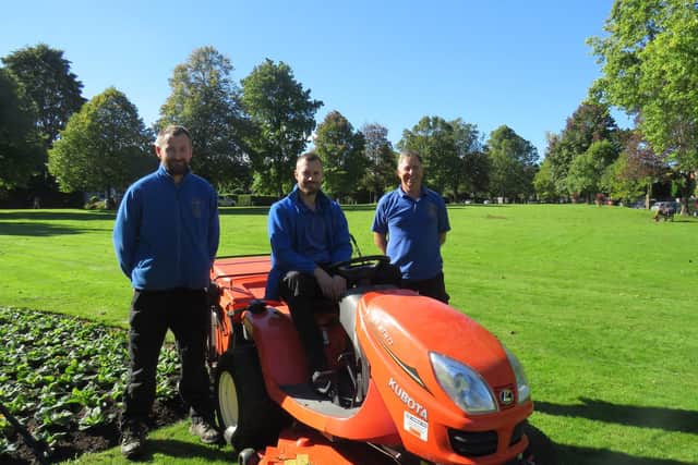 Muster Green has won its seventh Green Flag Award. This picture shows head grounds man Andy Stempt with grounds staff members.