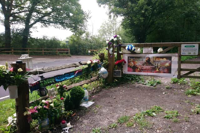 Tributes left at the side of the A281 at its junction with the Downs Link