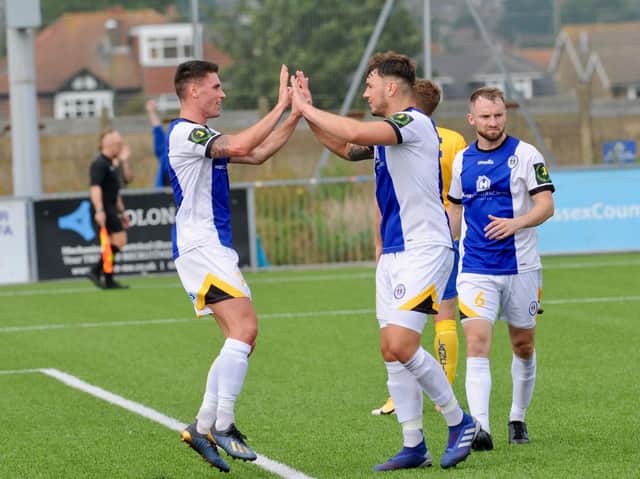 Josh Clack (left of picture, celebrating a goal at Lancing earlier in the season) scored the only goal against Chichester City / Picture: Stephen Goodger