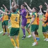 The Horsham players celebrate beating Woking / Picture: John Lines