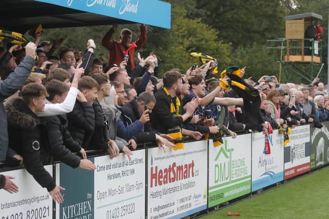 And the fans celebrate too... Picture: John Lines