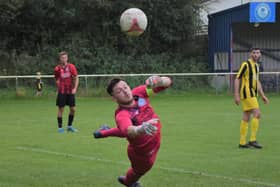 The Loxwood keeps out one AFC Uckfield effort - but the Oakmen won the SCFL clash 3-1 / Picture: Mike Skinner