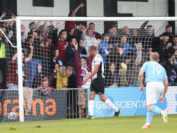 Hastings fans celebrate Kenny Pogue's goal in the Cup tie at Maidenhead / Pictrure: Scott White