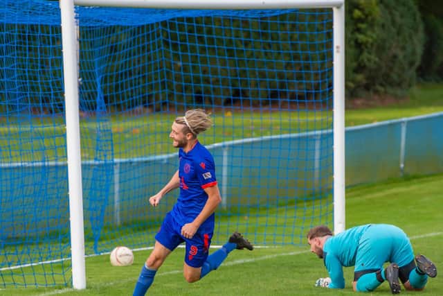 Robbie Tambling scores for Midhurst in their 4-1 beating of Wick / Picture: Tommy McMillan