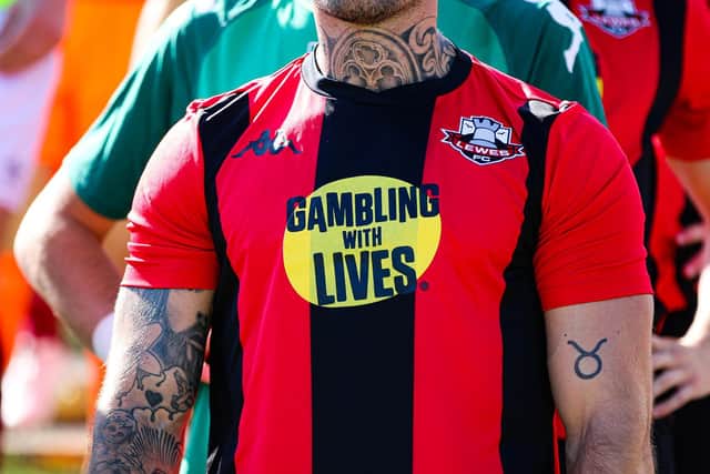 The Gambling With Lives logo on the Lewes shirts / Picture: James Boyes
