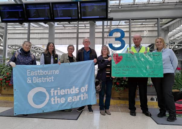 Waitrose donates £500 to the Friends of the Earth volunteers greening up Eastbourne train station SUS-211022-112818001