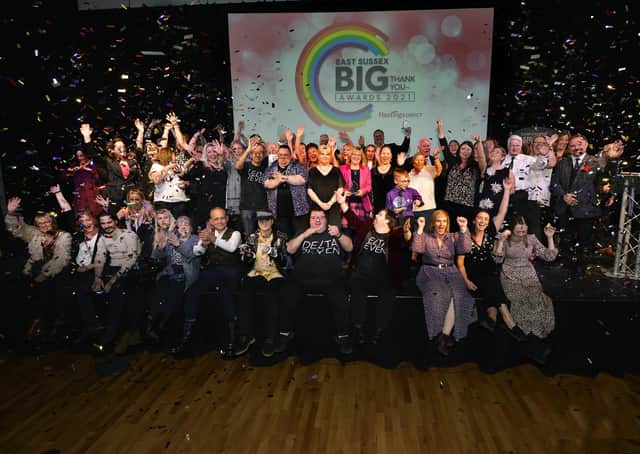 East Sussex Big Thank you Awards 2021. All the Winners celebrate on stage (Pic by Jon Rigby) SUS-211022-103215008