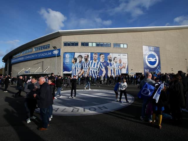 Fans arrive prior to the Premier League match between Brighton and Hove Albion and Manchester City at the Amex. (Photo by Steve Bardens/Getty Images)