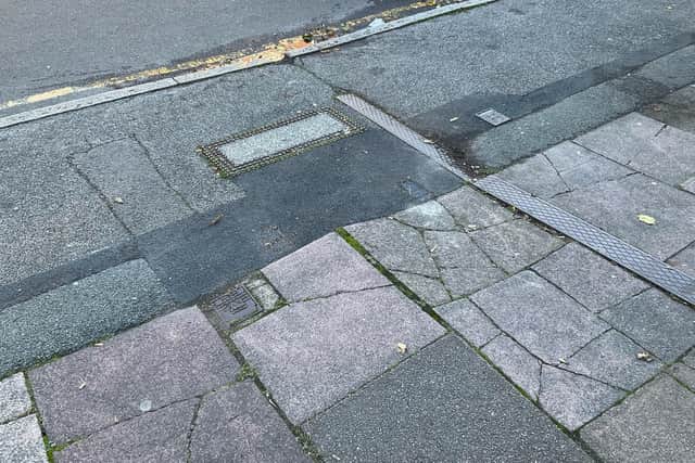 The pavement Eileen tripped on. SUS-211025-111801001