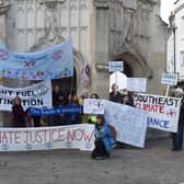 A climate protest at Chichester's Market Cross on Friday