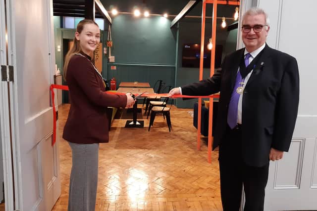 Worthing deputy mayor Richard Nowac and deputy youth mayor Henny Sonnamann-Petty cut the ribbon to officially open the new youth lounge at St Matthew's Church in Worthing