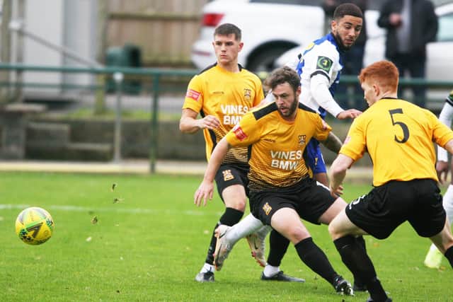 Action from Bridges’ West Sussex derby with Heath