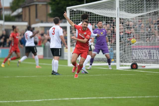 Ollie Pearce - seen here after a goal at he weekend v Lewes - was on target again versus Merstham / Picture: Marcus Hoare