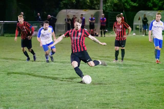 Archie Goddard fires home from the penalty spot to see Billingshurst advance in the Sussex Senior Cup at the expense of Newhaven. Pictures by Iain Gibson