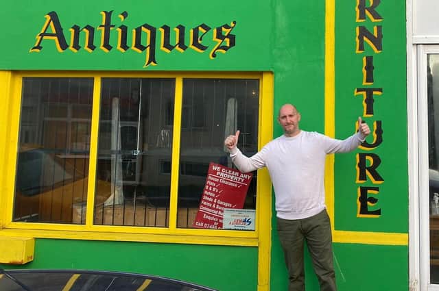 Steve Philbey outside his shop, Antiques on Sea, in St Leonards at the weekend, where he held a two-day stock clearance to raise money for his family following his terminal cancer diagnosis. Picture by Danny Wood SUS-211027-102709001