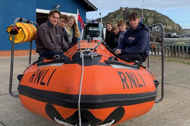 Teenagers Millie Marchant, Emma Sandeman, Oscar Howitt, George Mummery, Ben Sandeman, Sonny Flynn, and Louis Lewis helped save the lives of two swimmers off Hastings SUS-211027-103623001