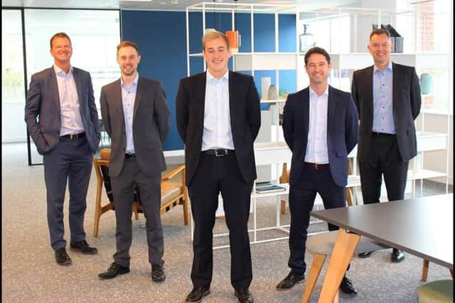 Mikael Goldsmith (centre) who has been appointed as senior surveyor in the Crawley office of expanding property consultancy Vail Williams, with colleagues, from left, Russell Mogridge, Matt King, Steve Berrett, Andrew Osborne