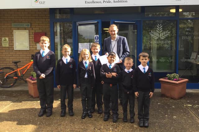 County Mall general manager Simon Cuckow personally delivered the much-needed laptops to Southgate Primary School