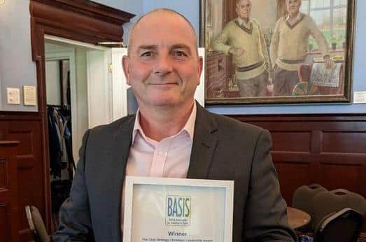 Stuart Slaney with the award
