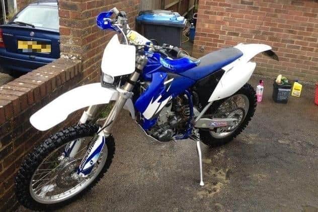 Police said one of the stolen motorbikes is a 2005 blue and white Yamaha WR-450 with the registration LJ05 BVA. Picture: Sussex Police.