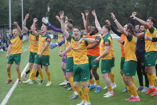 Horsham celebrate their FA Cup giant-killing of National League outfit Woking in the fourth qualifying round. Picture by John Lines