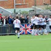 Lewes celebrate finding the back of the net in their high-scoring defeat at Worthing. Picture by Stephen Goodger