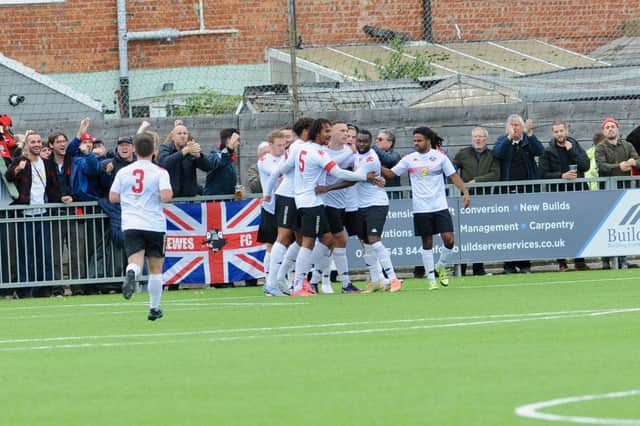 Lewes celebrate finding the back of the net in their high-scoring defeat at Worthing. Picture by Stephen Goodger