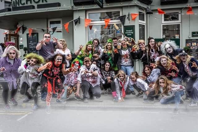 Zombie flash mob in Eastbourne this weekend. Photo from Cherry Dance. SUS-211029-112754001