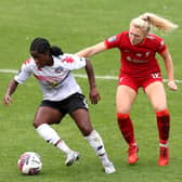 Freda Ayisi of Lewes battles for possession with Ceri Holland of Liverpool (Photo by Lewis Storey/Getty Images)