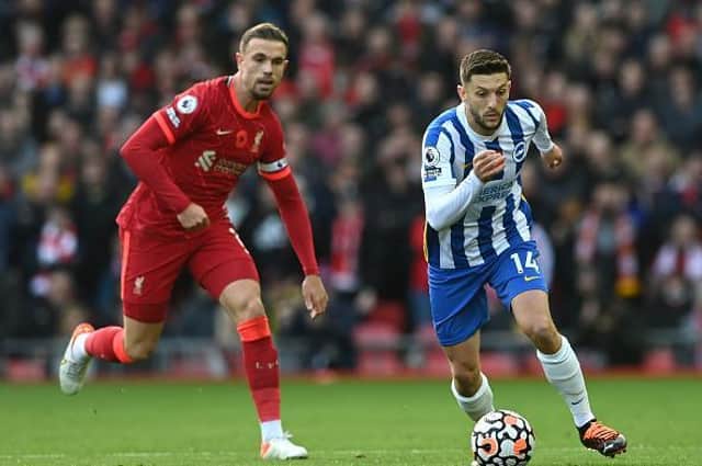 Albion's Adam Lallana enjoyed a midfield tussle with his old Liverpool teammate Jordan Henderson at Anfield