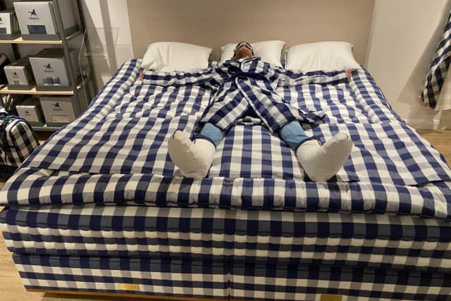 Senior reporter Sam Dixon-French tries out a Hastens bed
