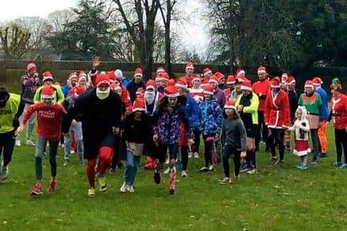 The Jingle Bell Jog takes place on December 5 in Chichester's Priory Park