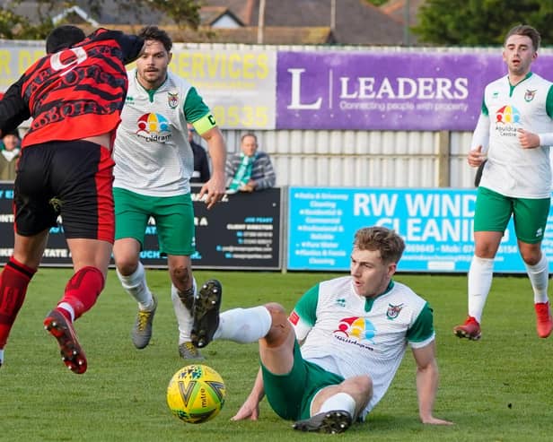 Bognor get stuck in to beat Waltham Abbey in the Trophy and set up a long trip west / Picture: Trevor Staff