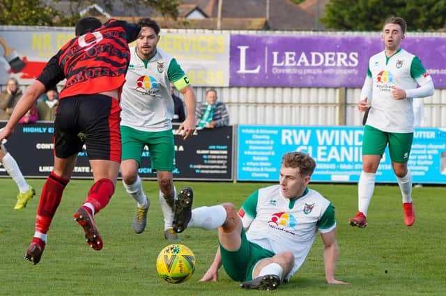 Bognor get stuck in to beat Waltham Abbey in the Trophy and set up a long trip west / Picture: Trevor Staff