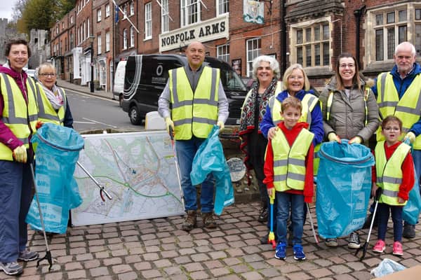 Clean-up volunteers in the town square with Andrew Griffith, MP for Arundel and South Downs, (centre) and deputy mayor Angela Standing (back row, right of Mr Griffith)
